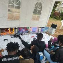 Outdoor tent gaming party setup